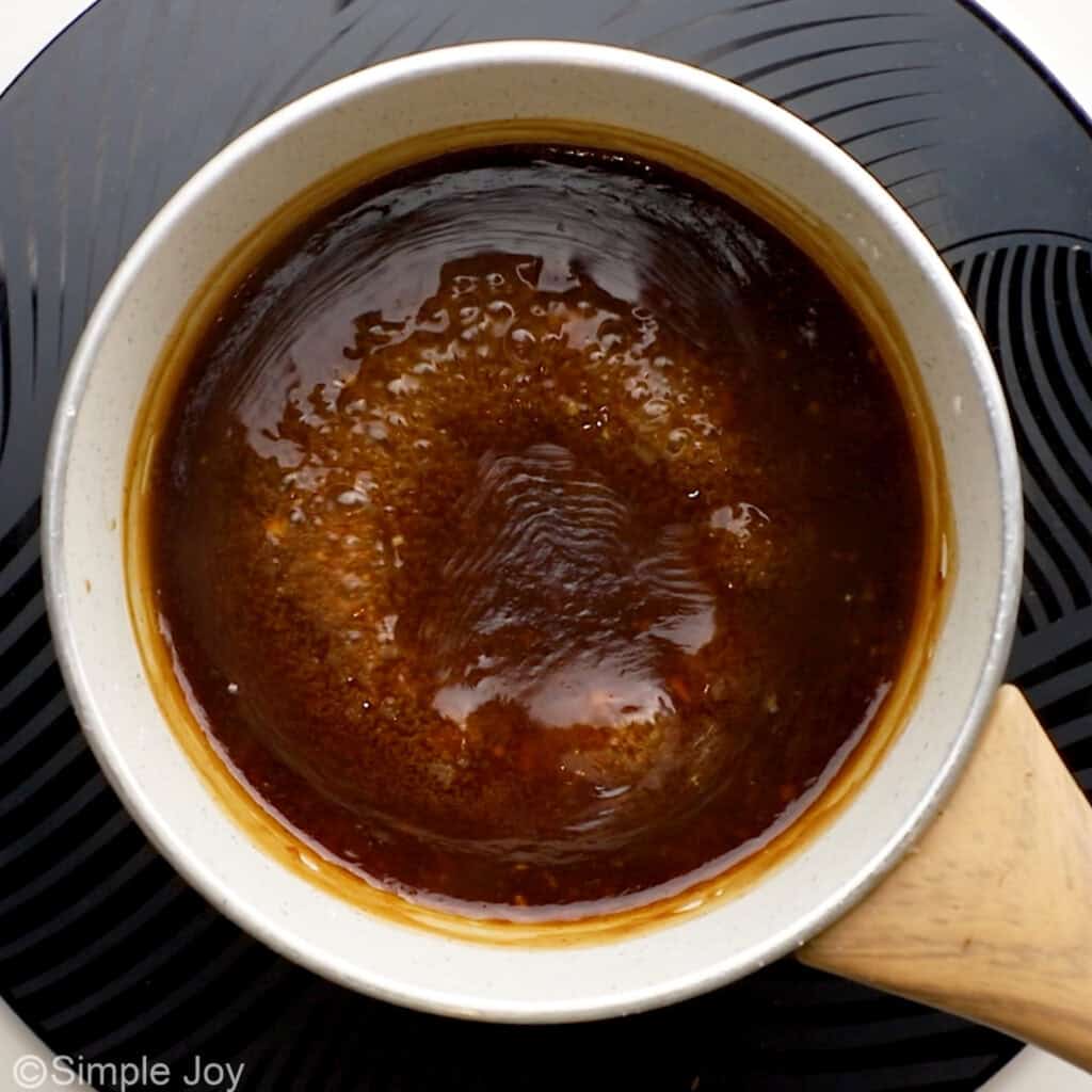 Overhead of saucepan of teriyaki sauce ingredients to make teriyaki chicken recipe