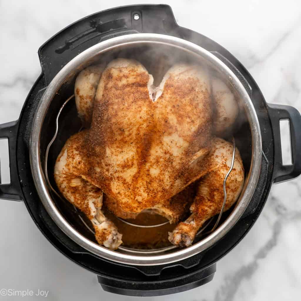 Overhead of whole chicken in an Instant Pot to make Instant Pot Whole Chicken
