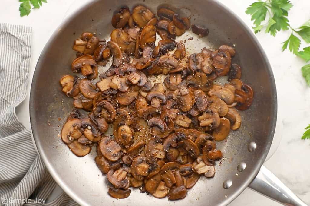 Overhead of skillet of sauteed mushroom ingredients