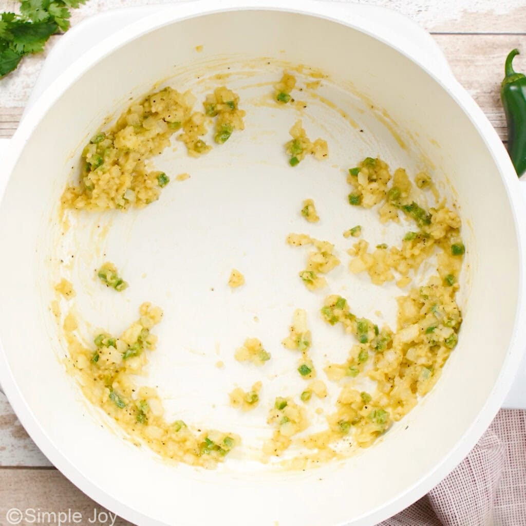 Overhead of large soup pot of white chicken chili ingredients