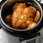 Instant Pot with whole chicken inside