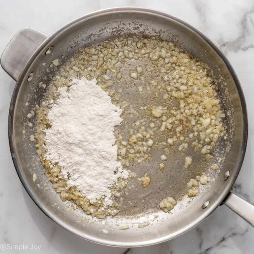 Overhead of skillet of easy chicken pot pie ingredients