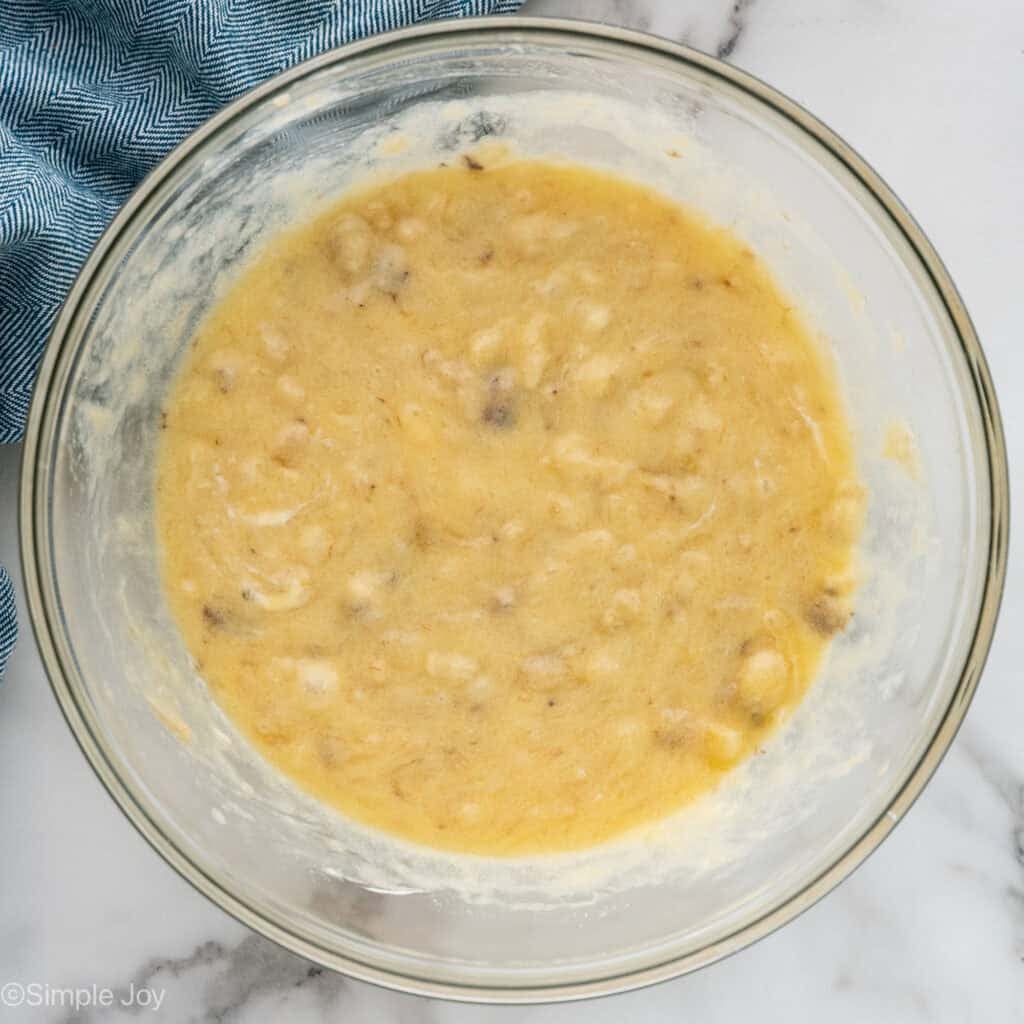 Overhead of bowl of banana bread ingredients
