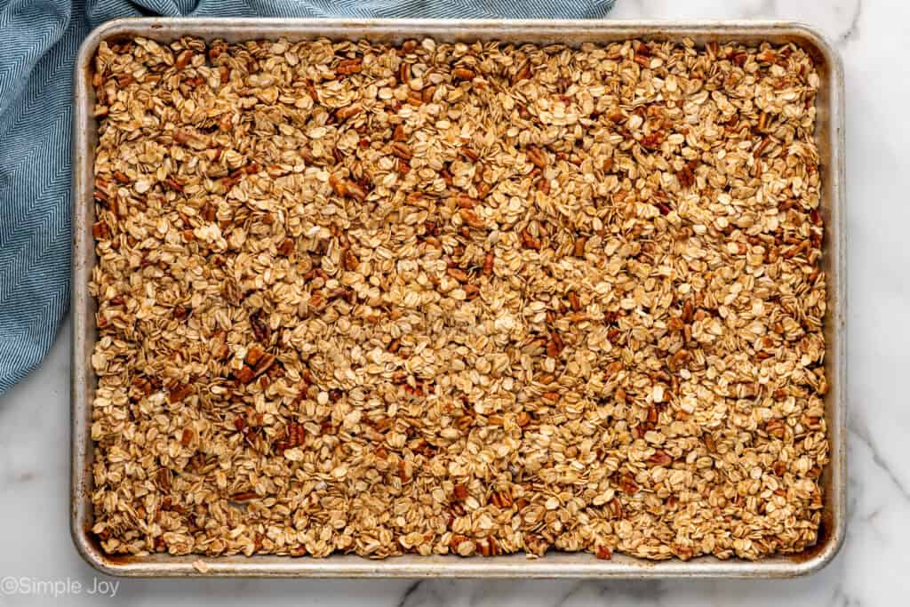 Overhead of baking sheet of granola ingredients