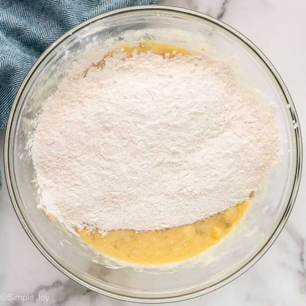 Overhead of bowl of banana bread ingredients