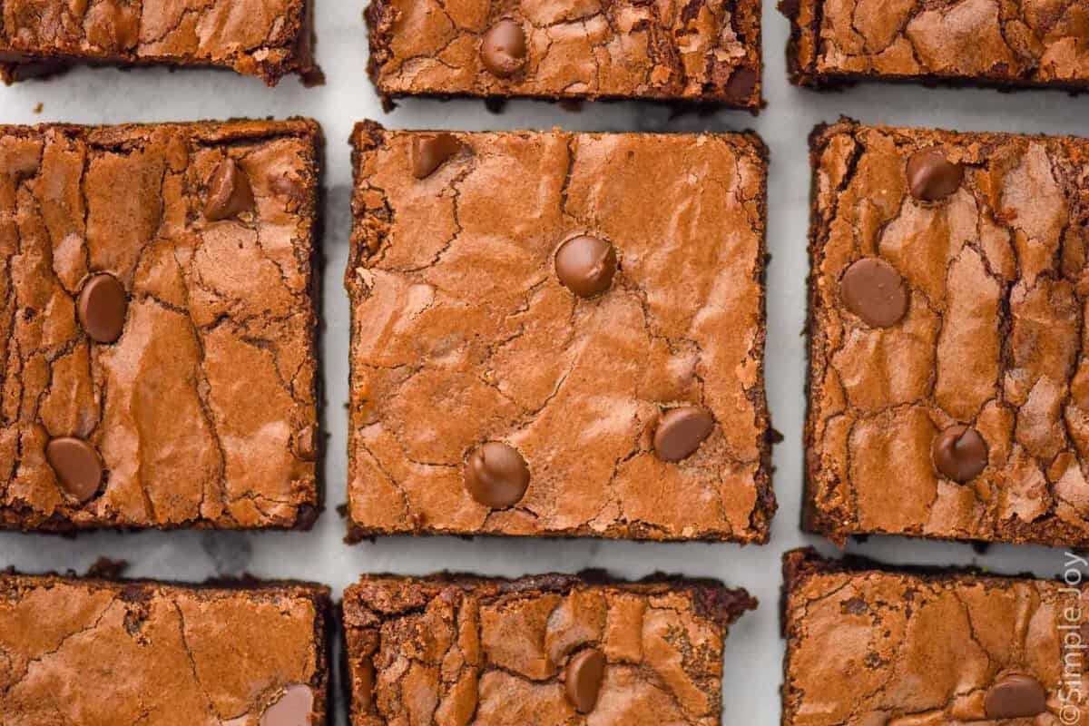 overhead of 9 chocolate brownies laid out in rows