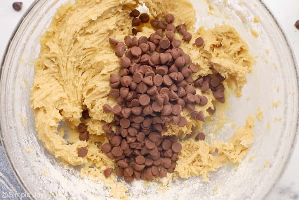 Overhead of bowl of pizookie ingredients with chocolate chips